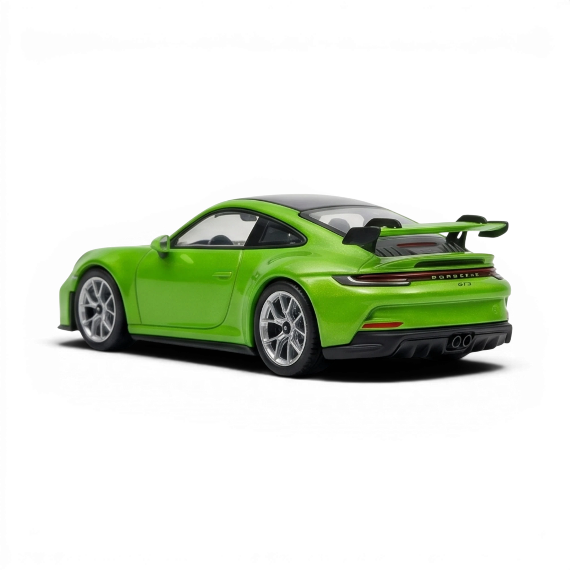 Lot57Supplies Diecast Shop green 1:64 scale resin Porsche 911 GT3 model with silver wheels and black spoiler.