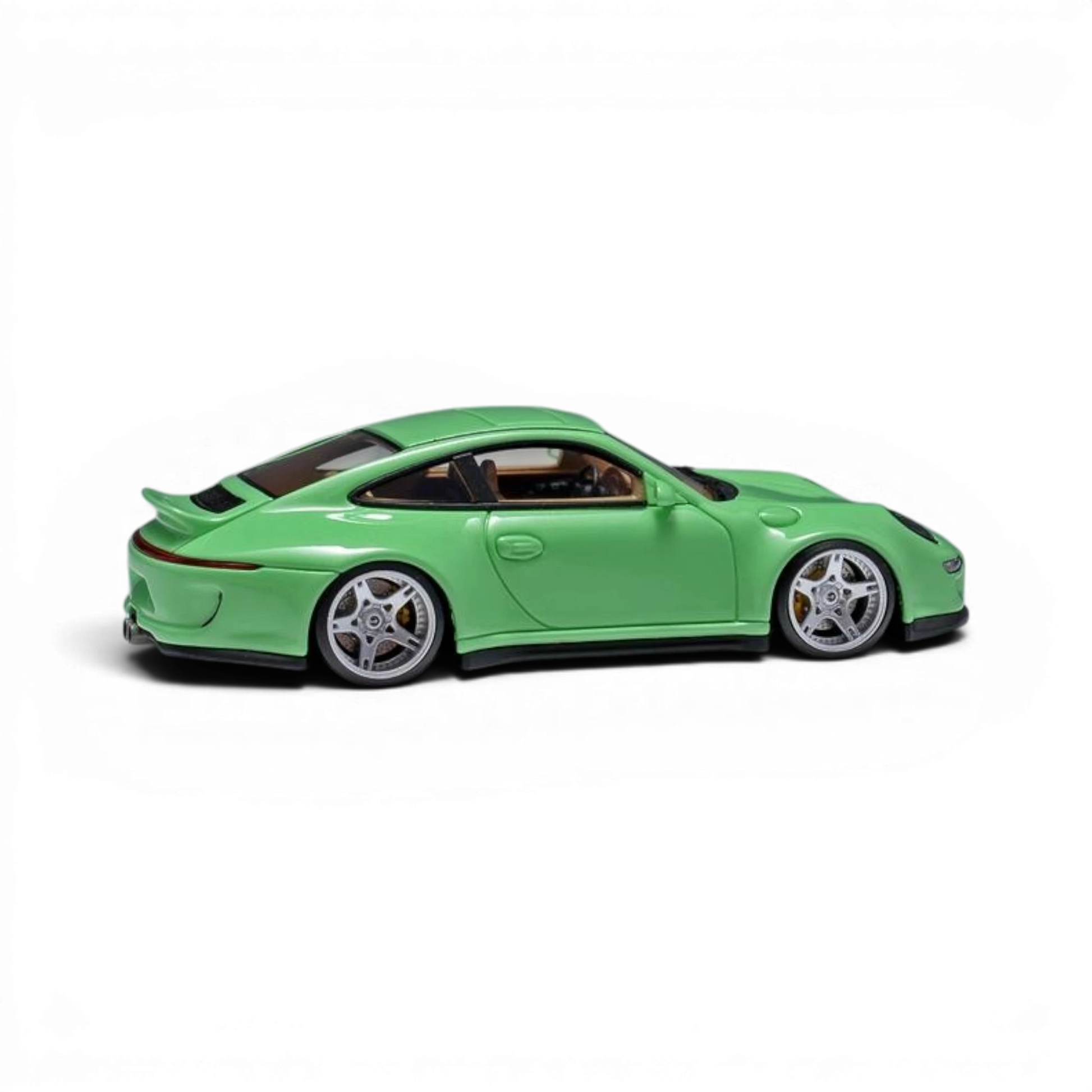 Lot57Supplies Diecast Shop green 1:64 scale resin Porsche 997 Indecent 009 model car with silver wheels.