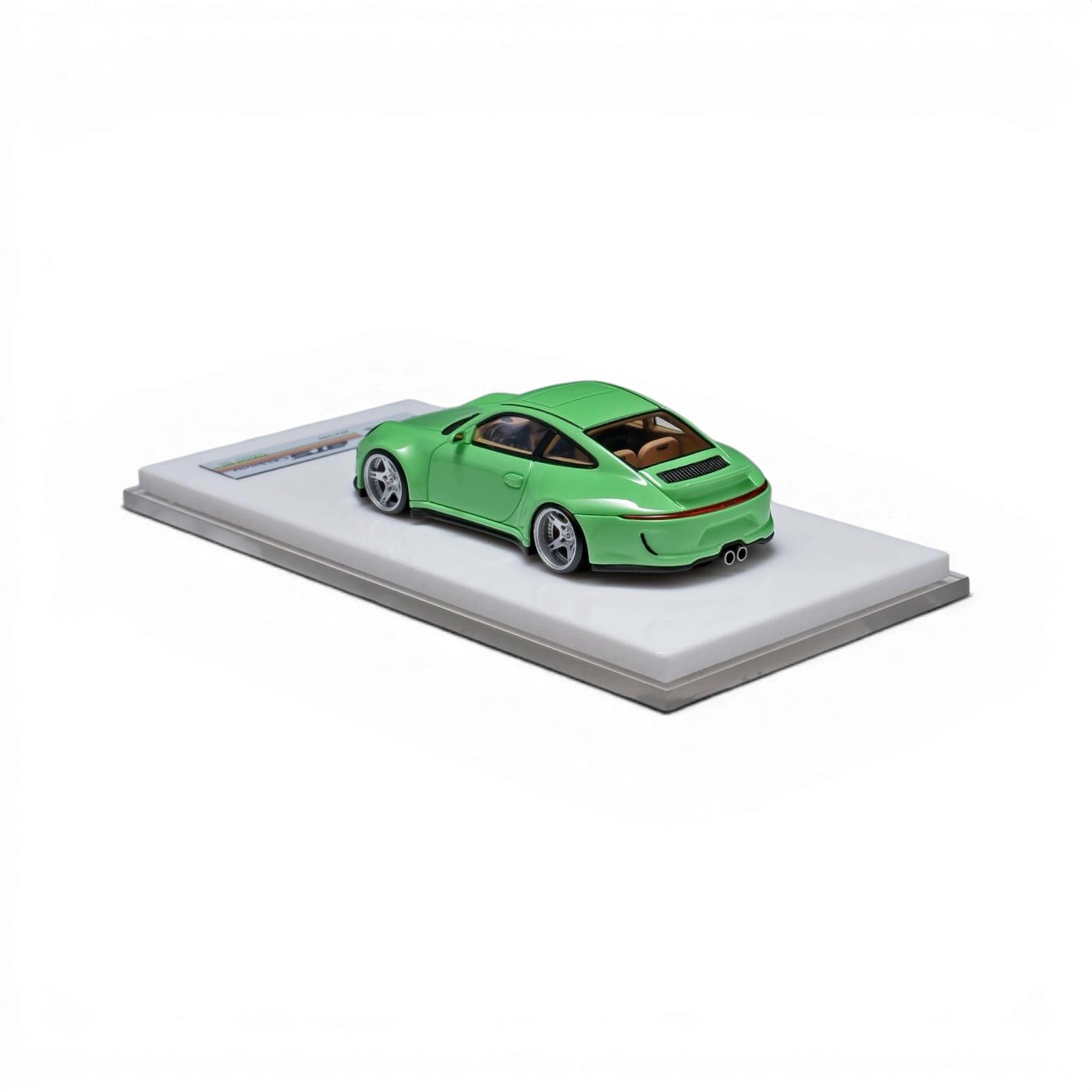Lot57Supplies Diecast Shop green 1:64 scale ERROR404 x BTS Porsche 997 Indecent 009 resin model car on display base.
