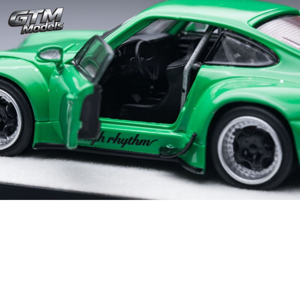 Lot57Supplies Diecast Shop GTM 1:64 scale green RWB993 diecast model car with open door and detailed interior