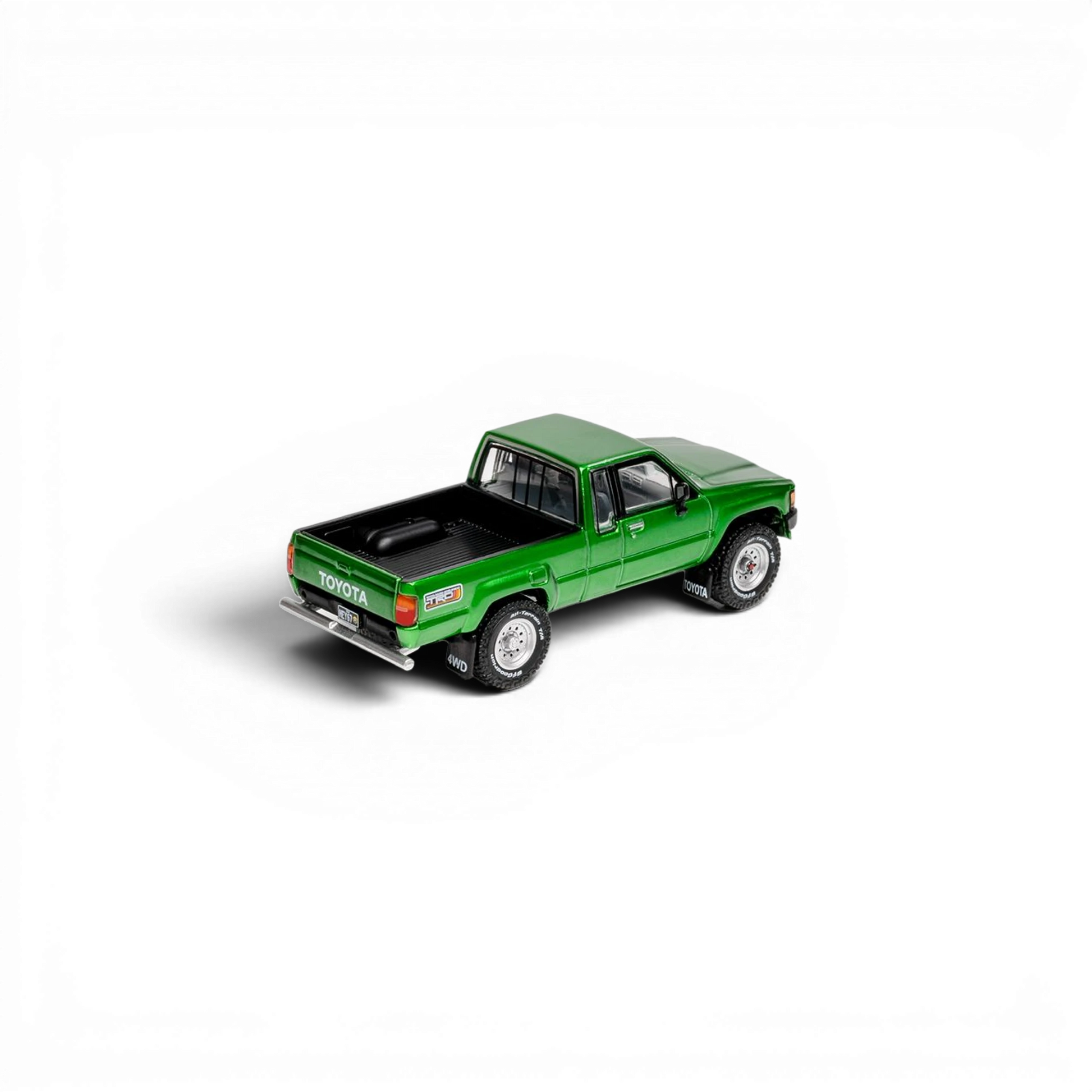Lot57Supplies Diecast Shop GCD 1:64 scale green Toyota Hilux Xtra Cab diecast pickup truck model