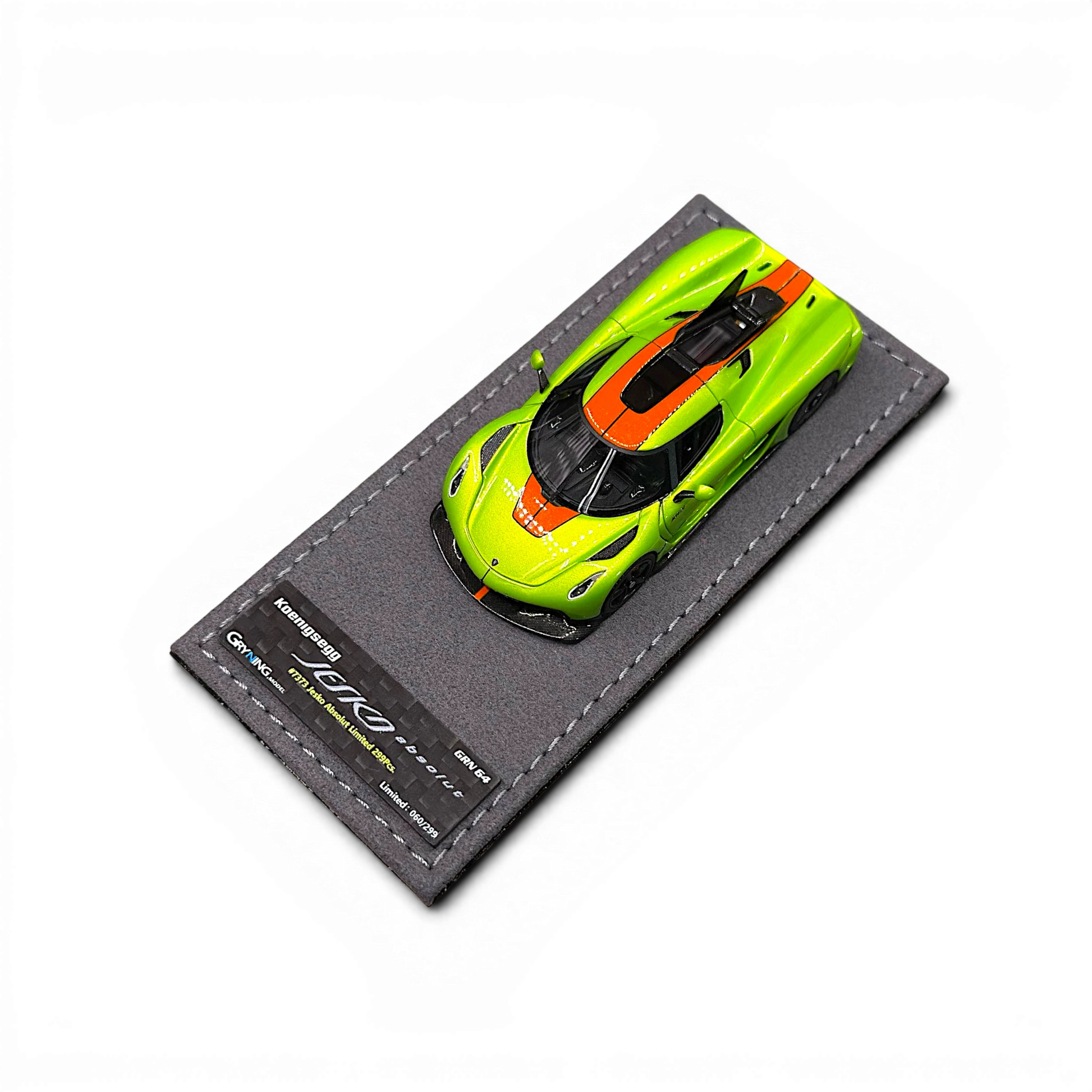 Lot57Supplies Diecast Shop GRYNING 1:64 scale Koenigsegg Jesko Absolut in green and sweet mandarin on display base