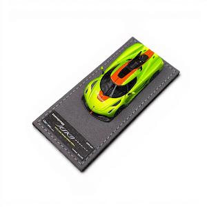 Lot57Supplies Diecast Shop GRYNING 1:64 scale Koenigsegg Jesko Absolut in green and sweet mandarin on display base
