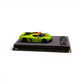 GRYNING Jesko Absolut 1:64 scale model in Jesko Green and Sweet Mandarin with carbon fiber details on a display base.