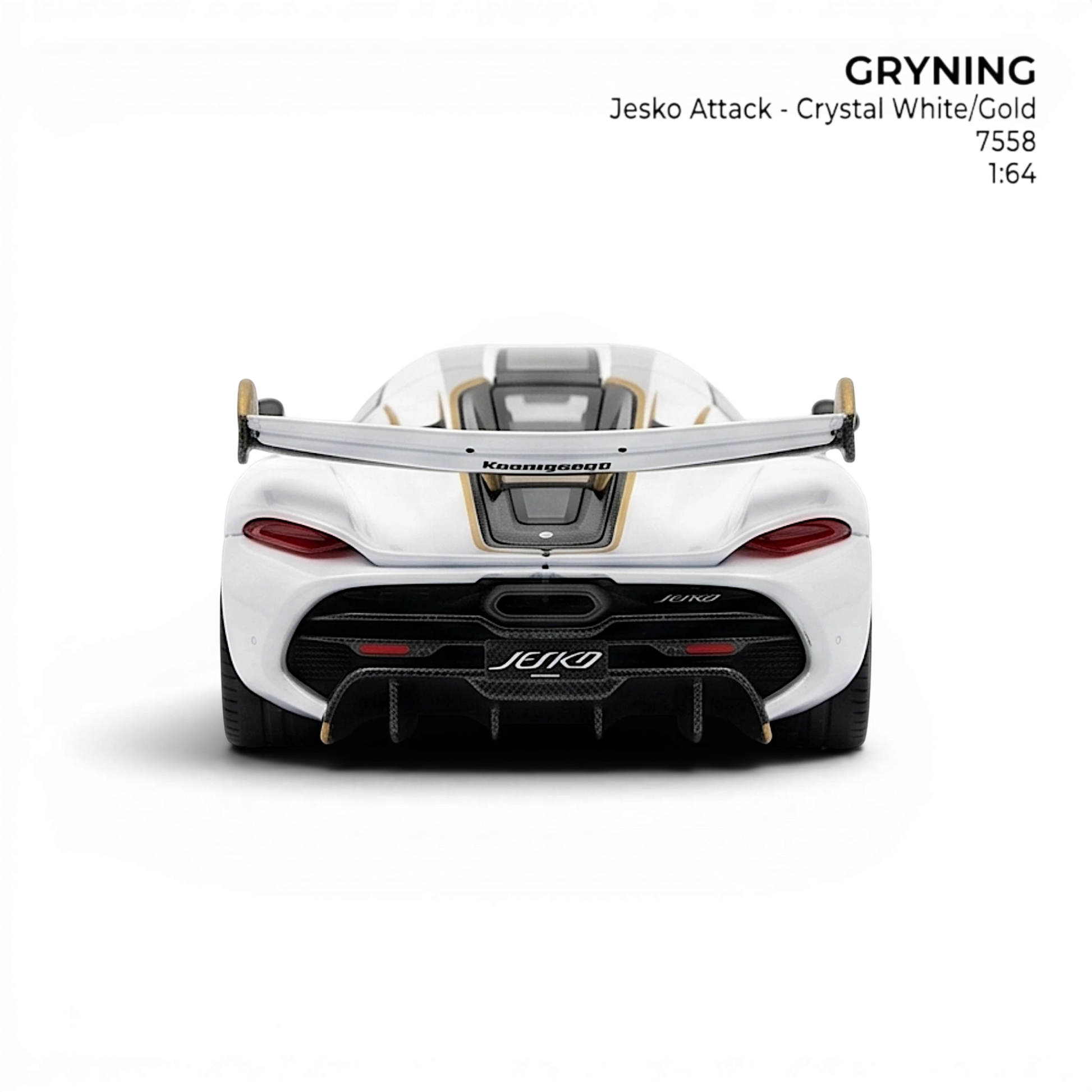GRYNING Jesko Attack 1:64 scale resin model in crystal white with gold accents and a large rear wing.