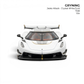 GRYNING Jesko Attack 1:64 scale resin model car in crystal white with gold accents and carbon fiber details.