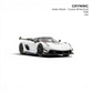 GRYNING Jesko Attack 1:64 scale resin model car in crystal white with gold accents and black wheels.