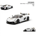 GRYNING Jesko Attack 1:64 scale resin model car in crystal white with gold accents and carbon fiber details.