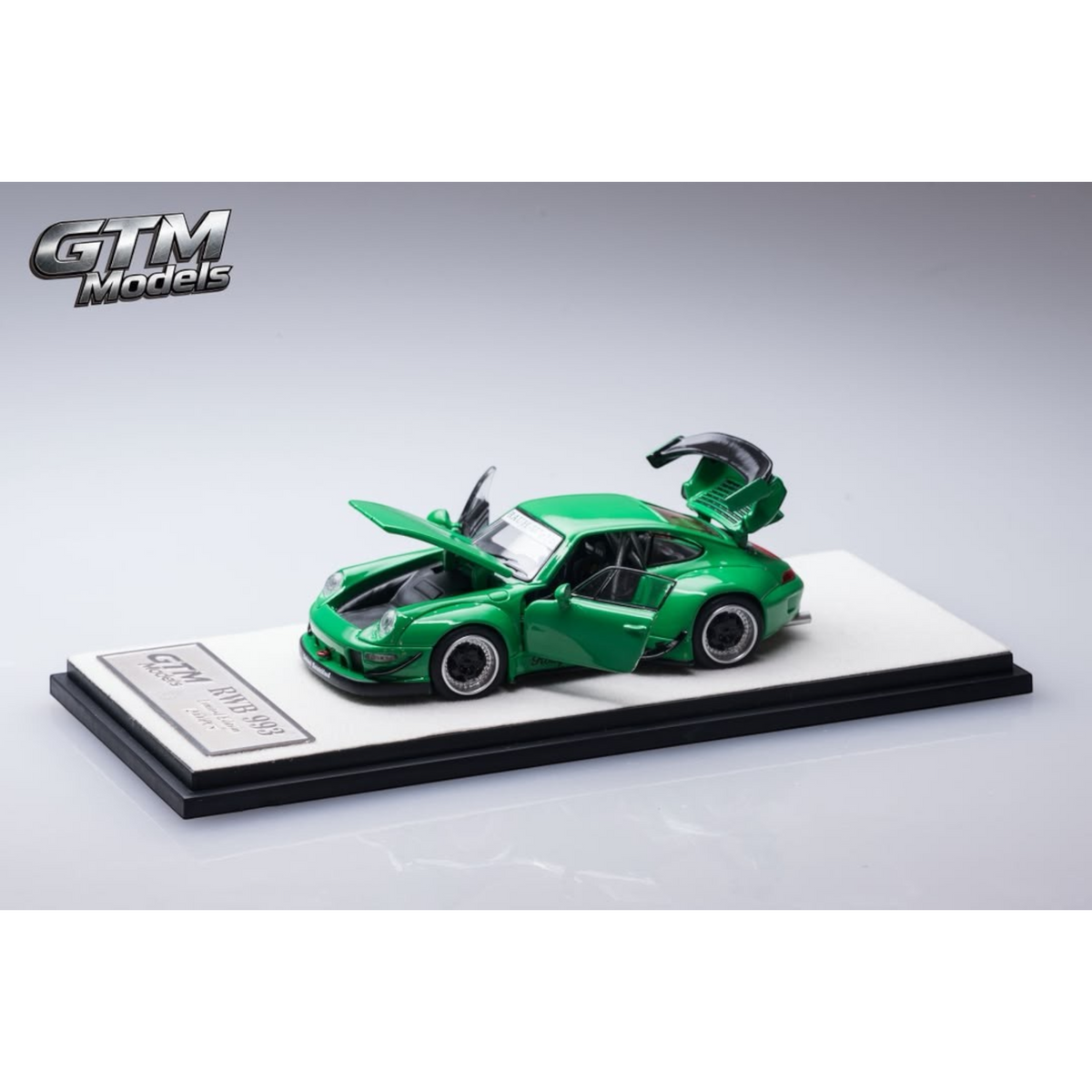 Lot57Supplies Diecast Shop GTM RWB993 green diecast model car in 1:64 scale with opening doors, hood, and engine cover.