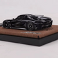 Lot57Supplies Diecast Shop GUO Jesko Absolut 1:64 scale resin model car in jet black on a brown display base.