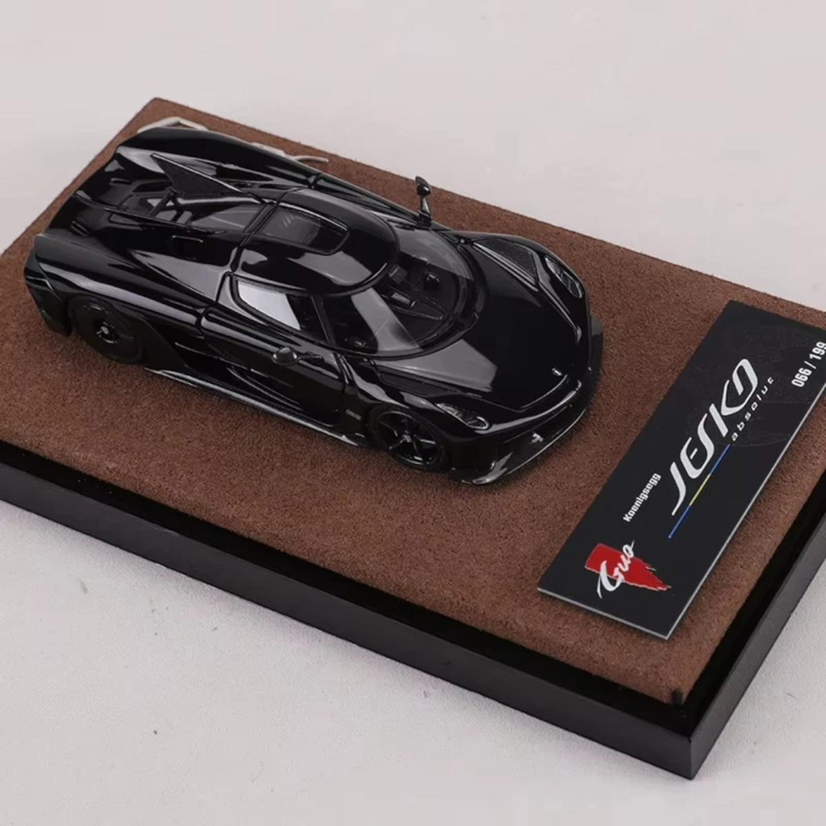 Lot57Supplies Diecast Shop GUO Jesko Absolut 1:64 scale resin model car in jet black on a display base