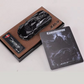 Lot57Supplies Diecast Shop GUO Jesko Absolut 1:64 scale resin model car in jet black on a display base with collector card