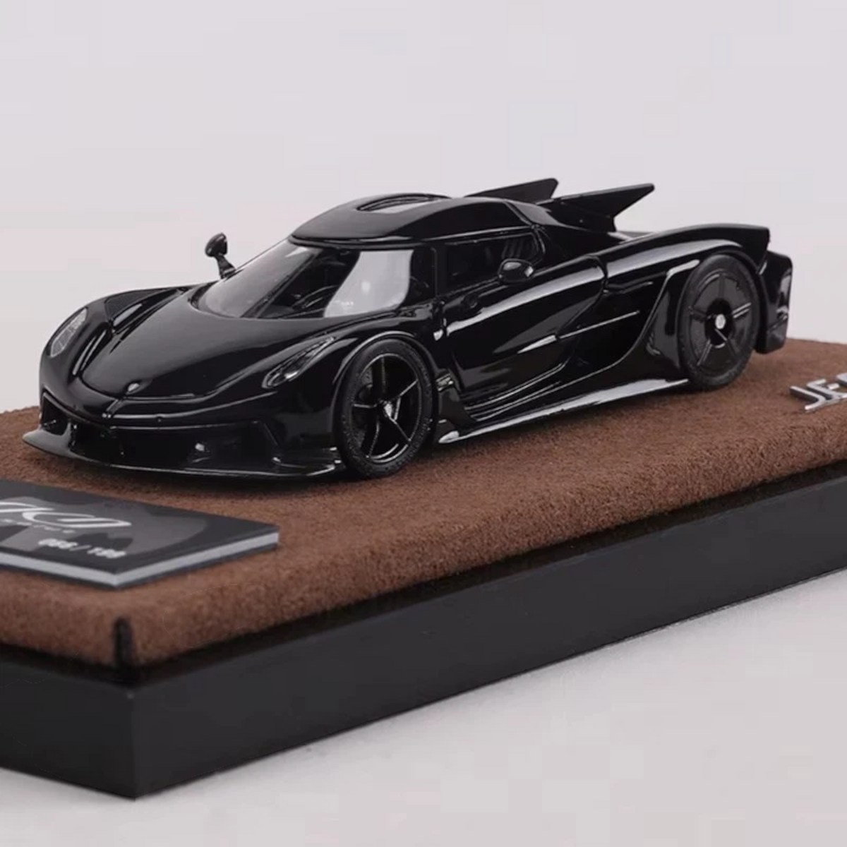 Lot57Supplies Diecast Shop GUO Jesko Absolut 1:64 scale resin model car in jet black on a brown display base