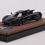 Lot57Supplies Diecast Shop GUO Jesko Absolut 1:64 scale resin model car in jet black on a brown display base
