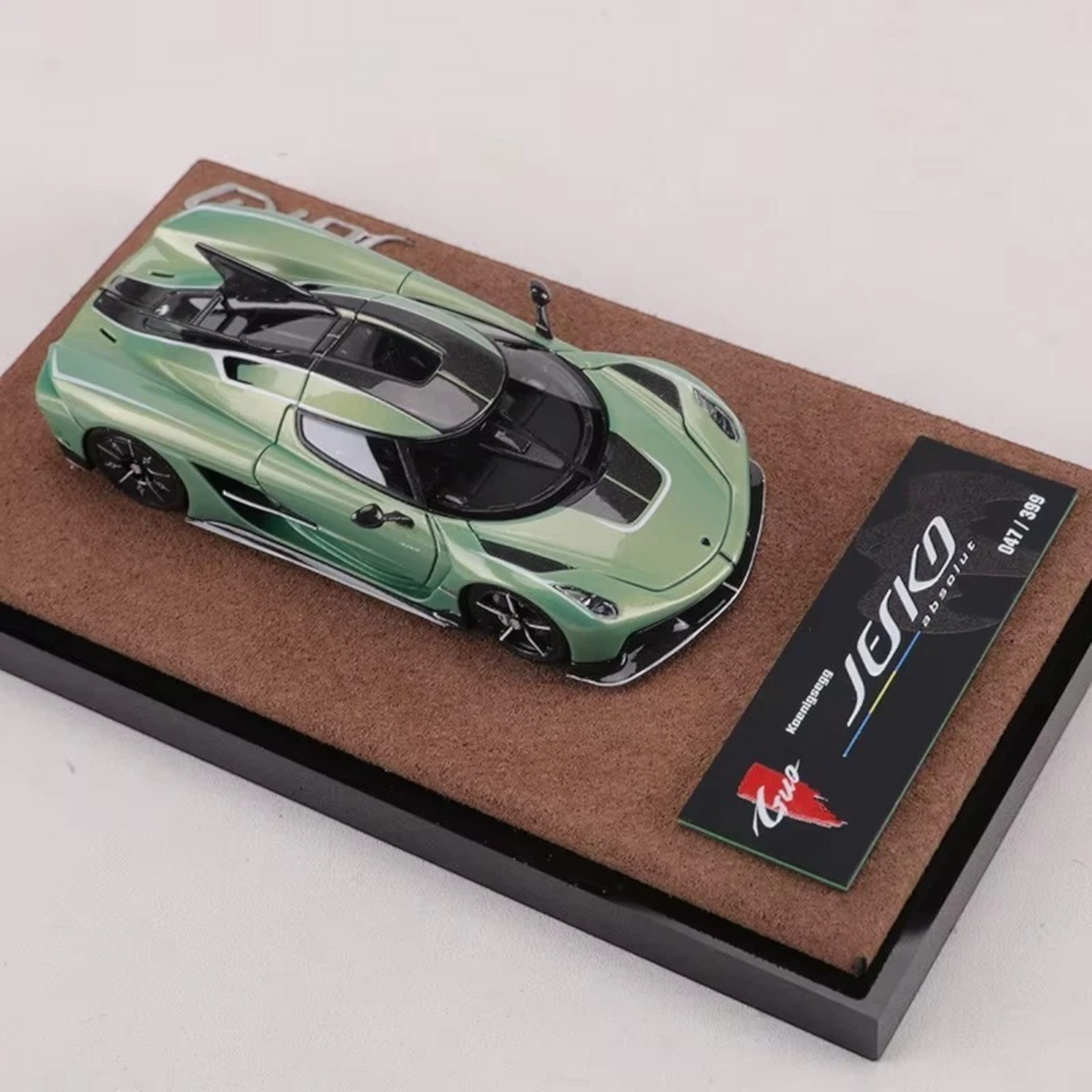 Lot57Supplies Diecast Shop GUO Jesko Absolut 1:64 scale resin model car in pearl green on a display base