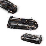 Lot57Supplies Diecast Shop HC Pagani Imola 1:64 scale resin model car in metallic grey with orange racing accents.