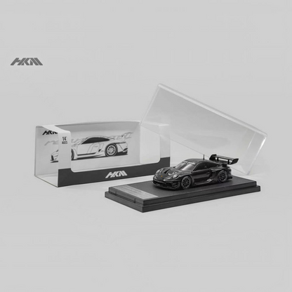 Lot57Supplies Diecast Shop HKM 1:64 scale gloss black Porsche 911 GT3 R Rennsport diecast model car with display case