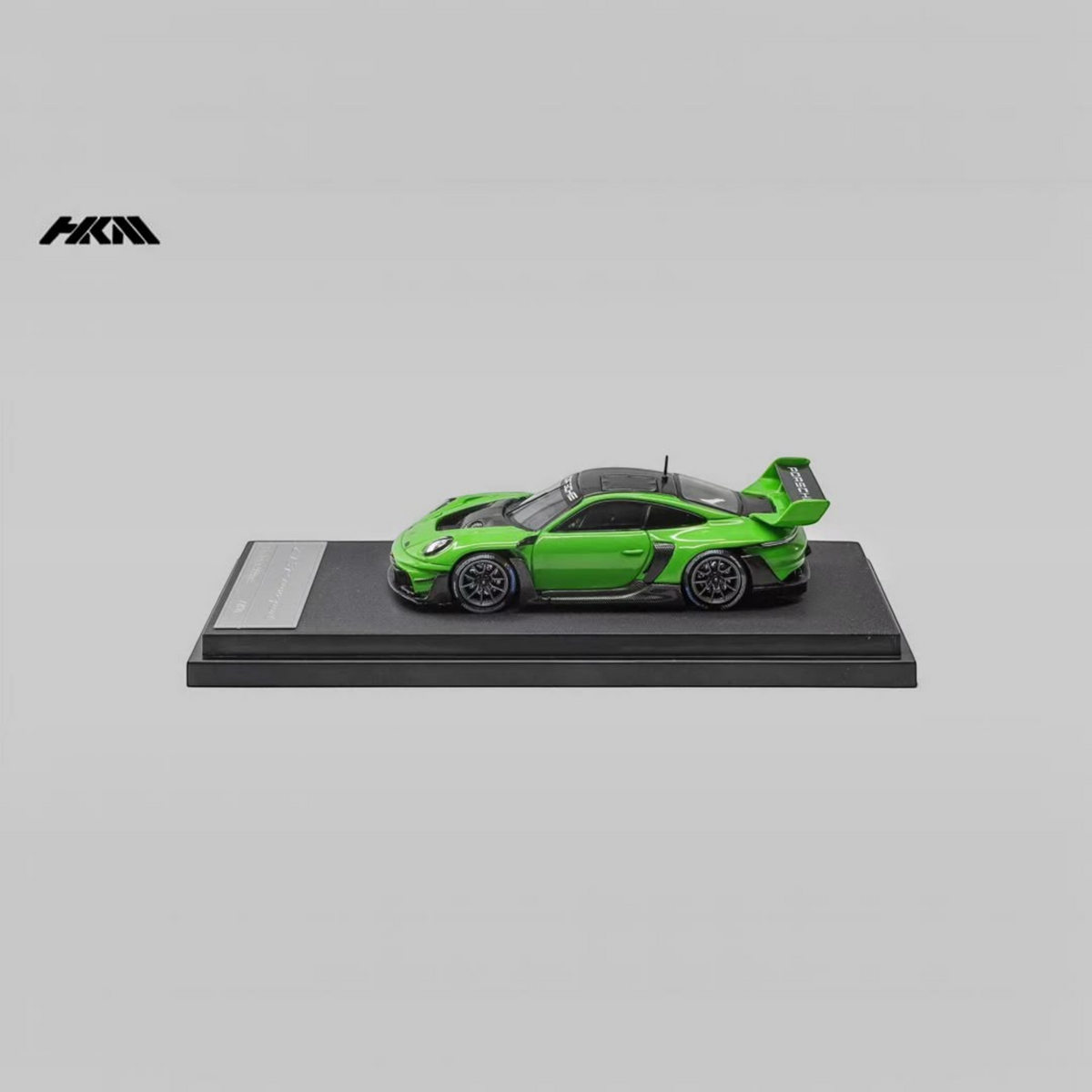 Lot57Supplies Diecast Shop HKM Porsche 911 GT3 R Rennsport diecast model in Viper Green on a display stand