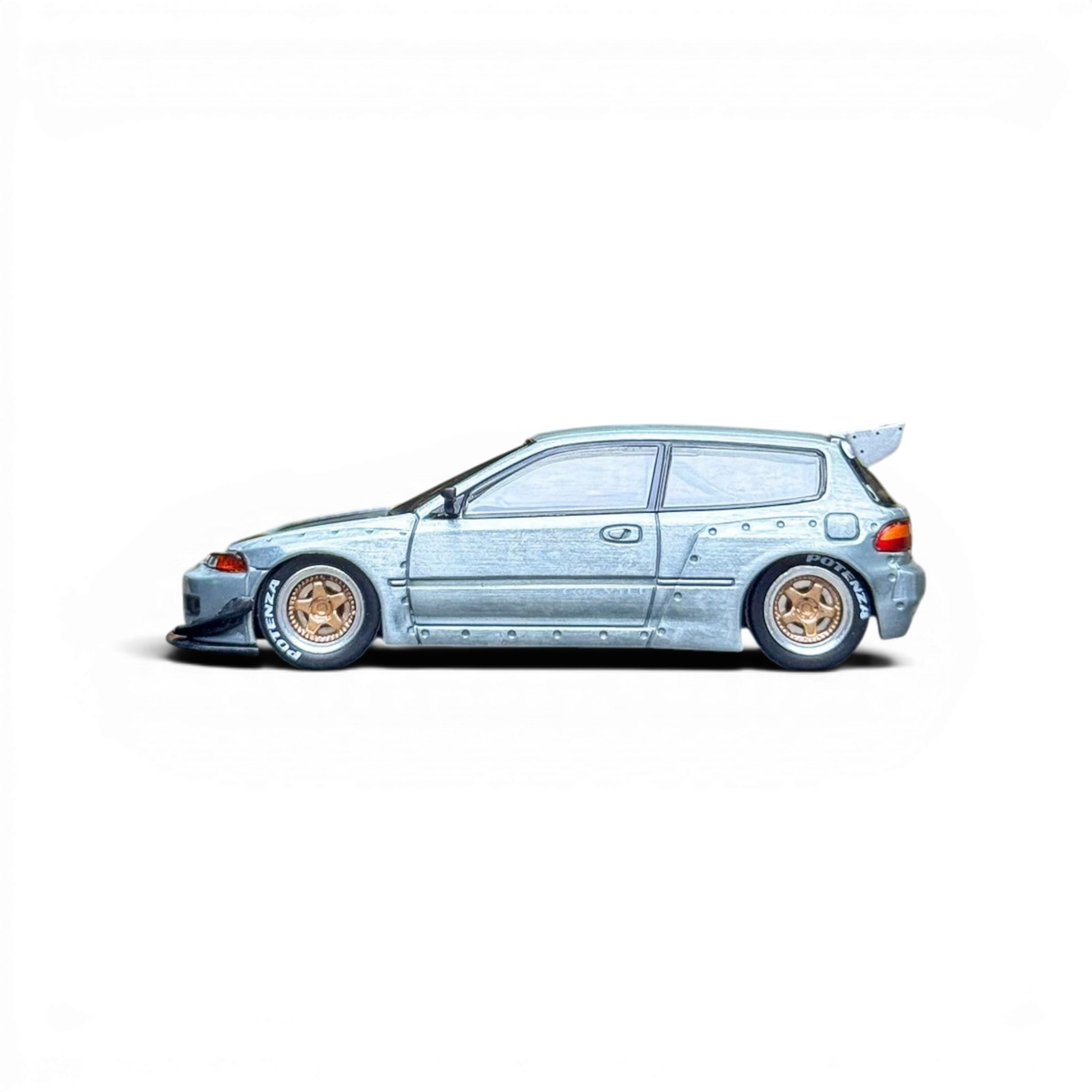 Lot57Supplies Diecast Shop 1:64 scale raw metal Honda Civic EG6 with gold rims and racing tires.