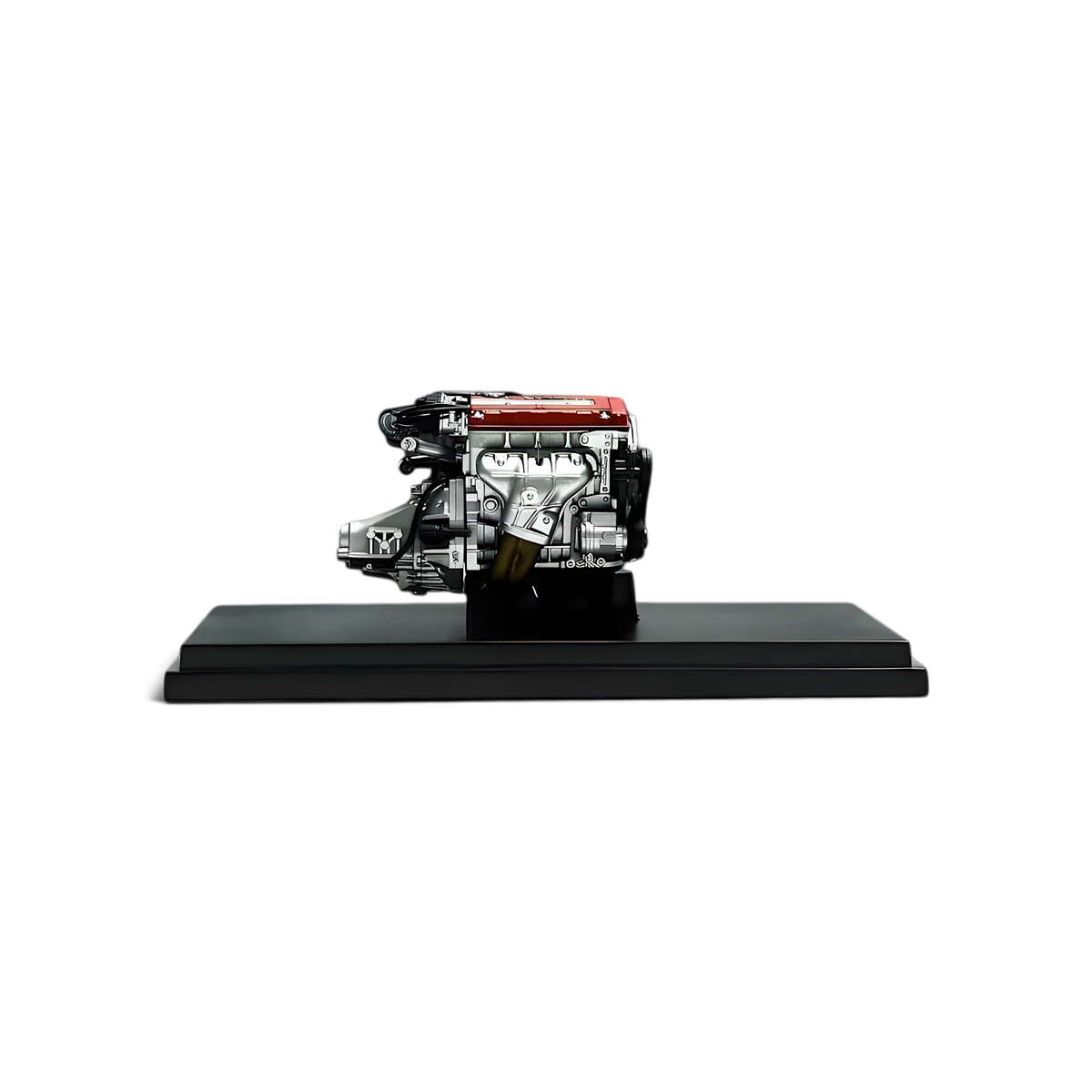 Lot57Supplies Diecast Shop 1:18 scale Honda Civic EK9 engine model with red valve cover on a black display stand