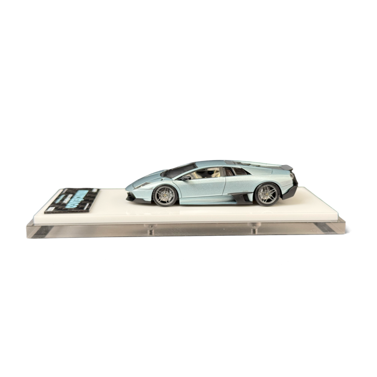 Lot57Supplies Diecast Shop WAM 1:64 scale ice blue Lamborghini Murcielago LP670 resin model car on display base