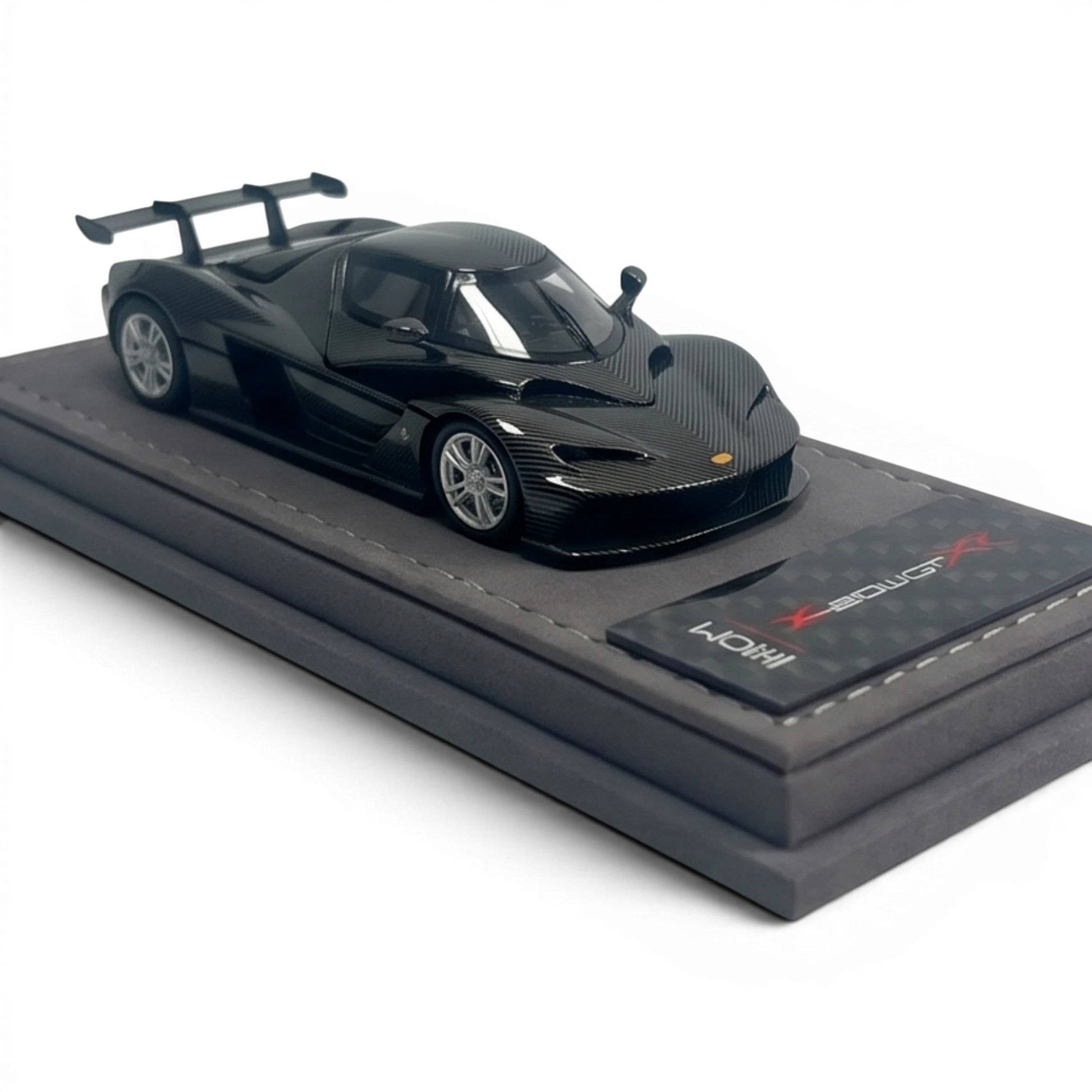 Lot57Supplies Diecast Shop iHCM KTM X-BOW GT-XR 1:64 scale model in gloss carbon fiber finish with detailed alloy body and rear wing.