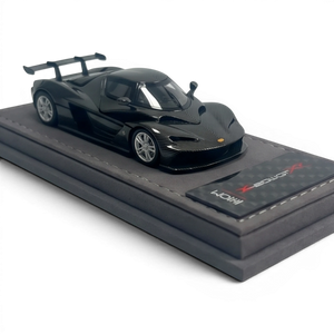 Lot57Supplies Diecast Shop iHCM KTM X-BOW GT-XR 1:64 scale model in gloss carbon fiber finish with detailed alloy body and rear wing.