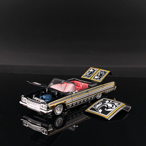 Lot57Supplies Diecast Shop Fine Works64 1:64 scale black and gold Impala lowrider diecast car with red interior