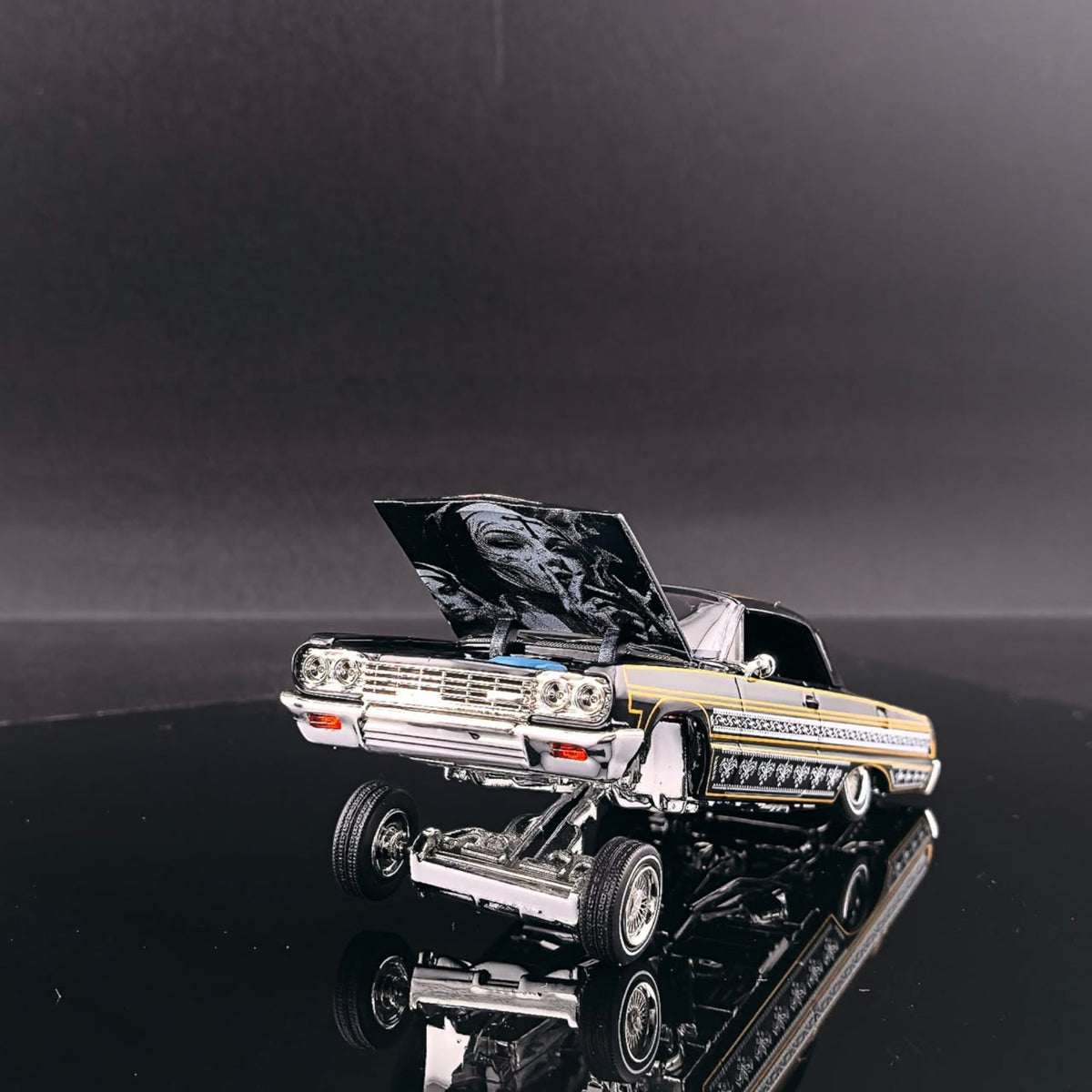 Lot57Supplies Diecast Shop Fine Works64 Impala lowrider in black and gold with detailed custom paint and open hood