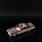 Lot57Supplies Diecast Shop 1:64 scale Fine Works64 Impala lowrider model car in black and gold with intricate detailing.