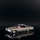 Lot57Supplies Diecast Shop 1:64 scale black and gold Impala lowrider diecast car with intricate detailing