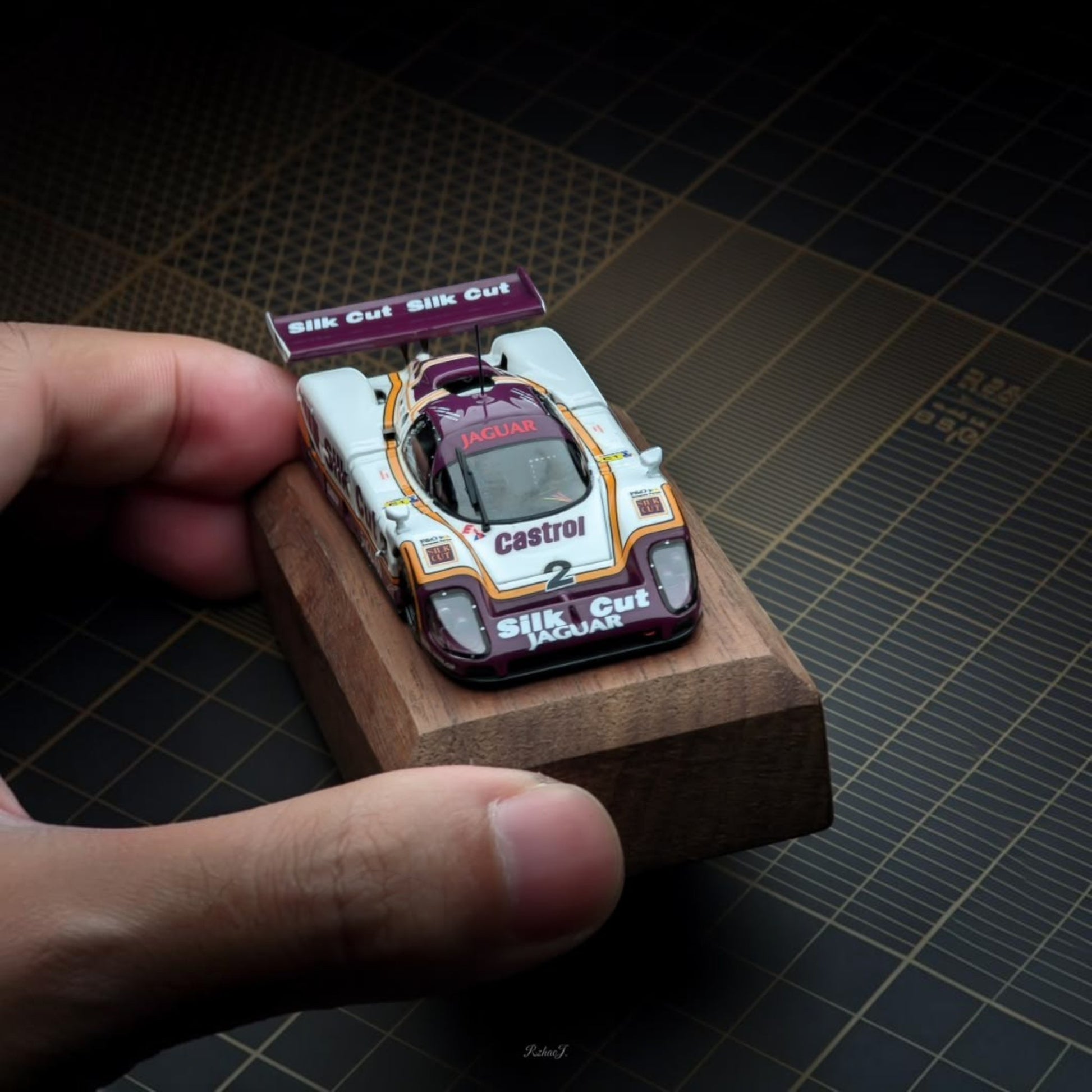 Lot57Supplies Diecast Shop 1:64 scale diecast Jaguar XJR-9 1988 Le Mans winner model car on a wooden display base