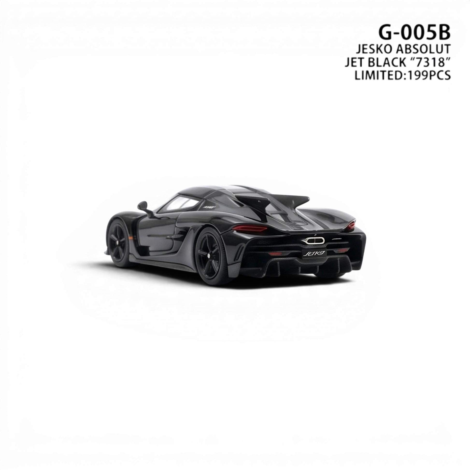 Lot57Supplies Diecast Shop GUO Jesko Absolut 1:64 scale resin model car in jet black with detailed rear spoiler and taillights.
