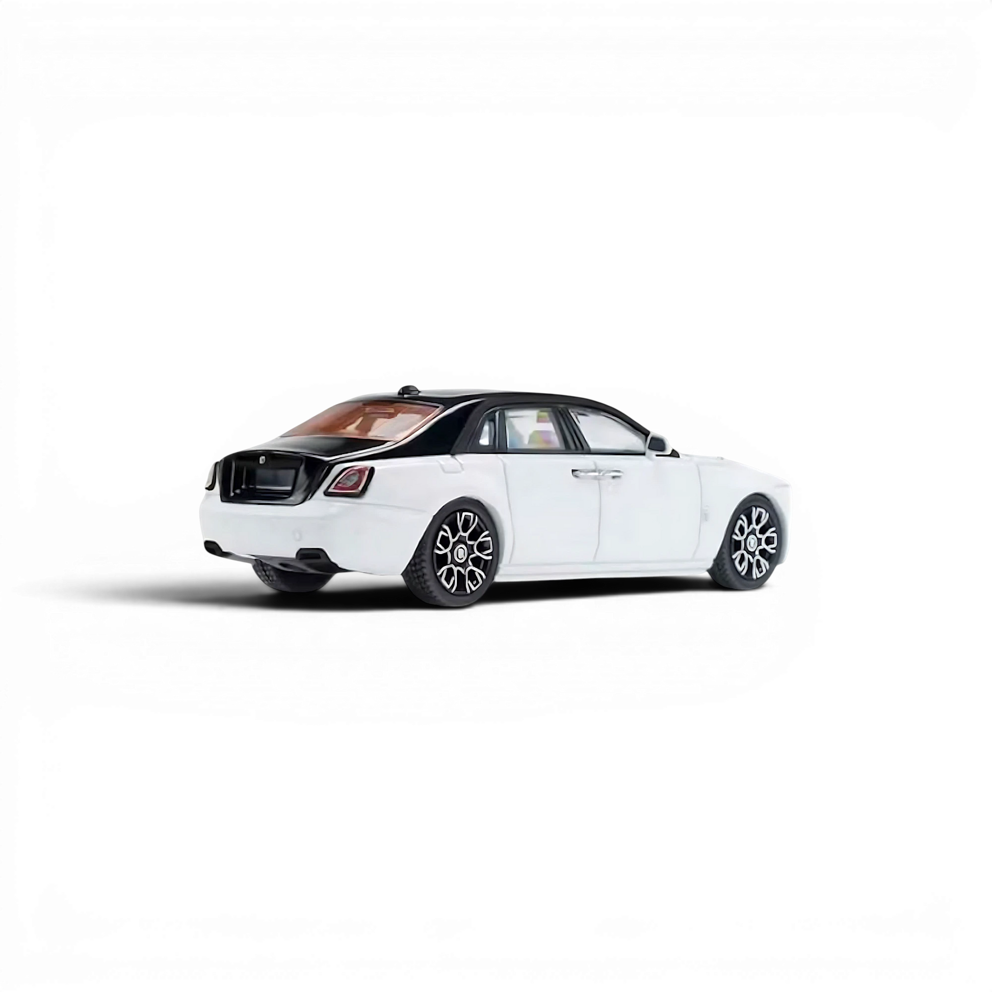 Lot57Supplies Diecast Shop 1:64 scale KING MODEL Ghost diecast car in a two-tone black and white finish