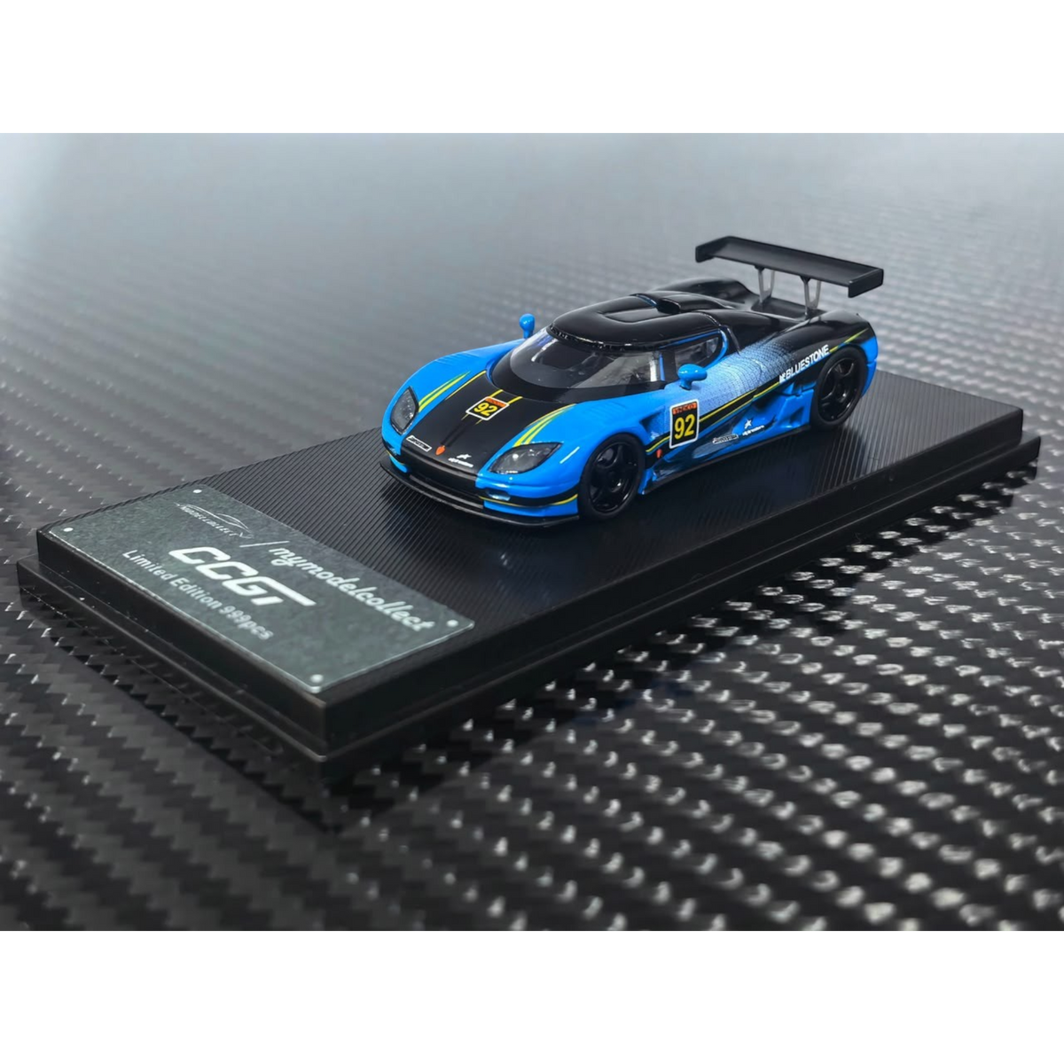 Lot57Supplies Diecast Shop 1:64 scale Koenigsegg CCGT diecast model in blue and carbon fiber livery with number 92