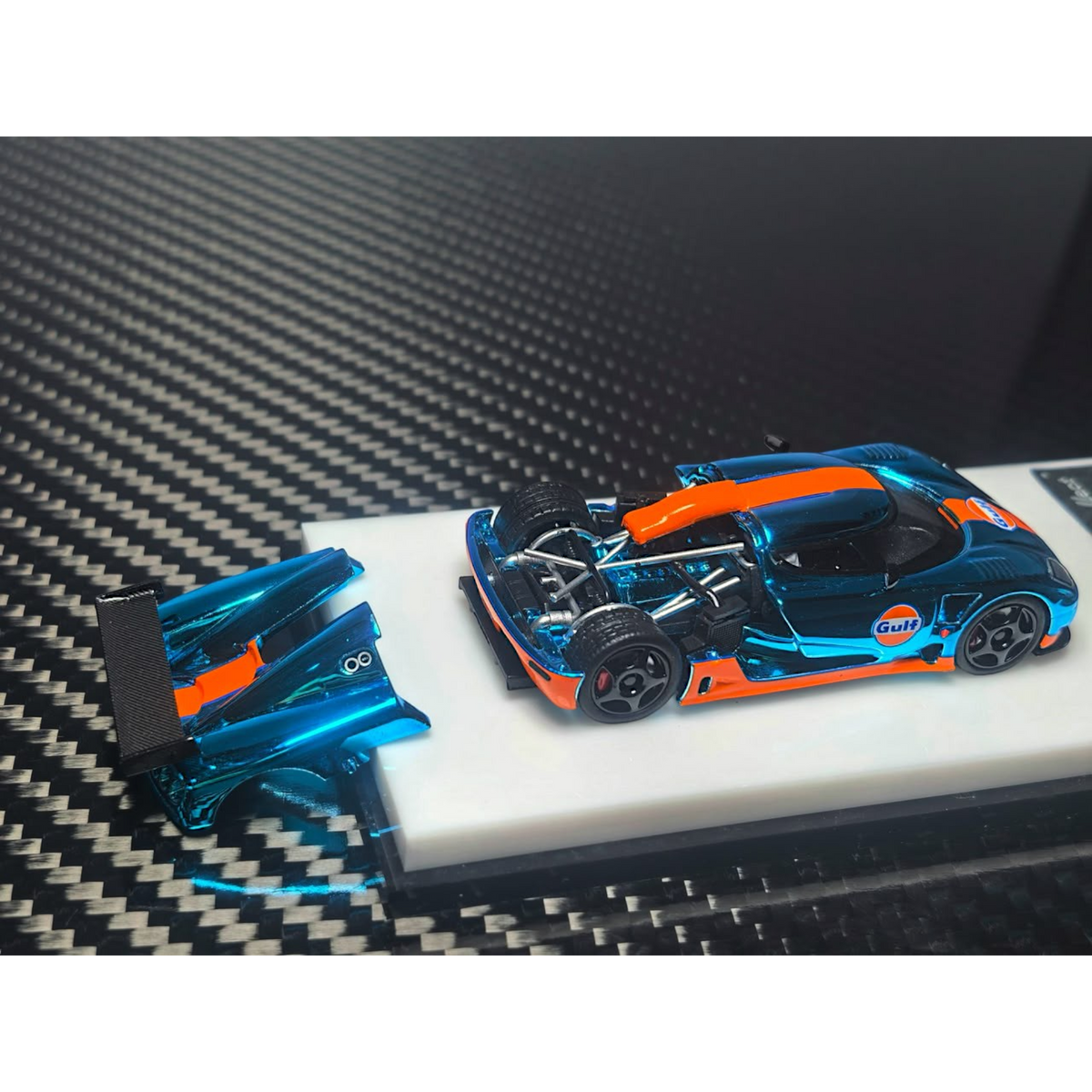 Lot57Supplies Diecast Shop 1:64 scale MC Koenigsegg CCGT diecast model in chrome Gulf blue and orange livery.