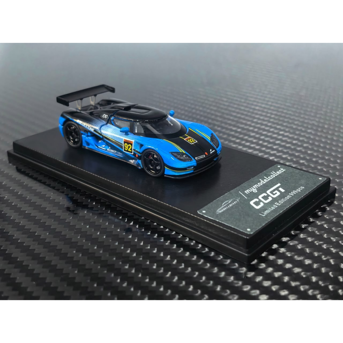 Lot57Supplies Diecast Shop 1:64 scale Koenigsegg CCGT diecast model in blue and carbon fiber livery with number 92