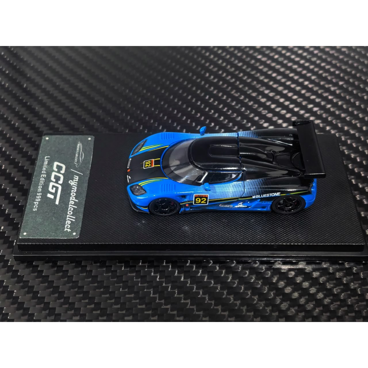 Lot57Supplies Diecast Shop 1:64 scale MC Koenigsegg CCGT diecast model car in blue and carbon fiber livery number 92
