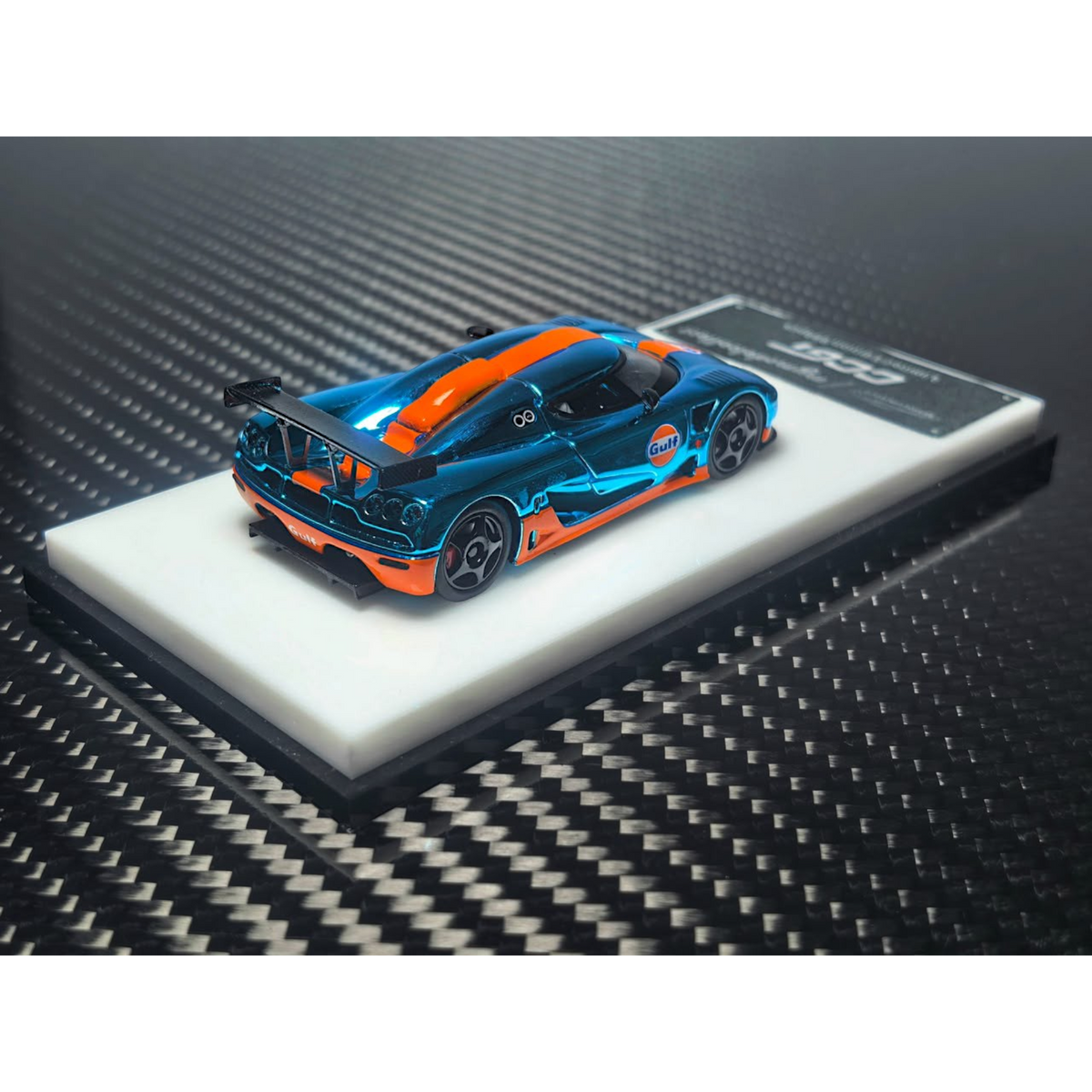 Lot57Supplies Diecast Shop 1:64 scale MC Koenigsegg CCGT diecast model in chrome Gulf blue and orange livery.