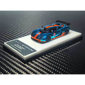 Lot57Supplies Diecast Shop 1:64 scale chrome Gulf blue and orange Koenigsegg CCGT diecast model car on display stand