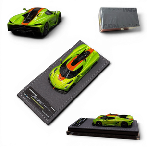 Lot57Supplies Diecast Shop GRYNING 1:64 scale resin Koenigsegg Jesko Absolut in green and sweet mandarin with carbon fiber