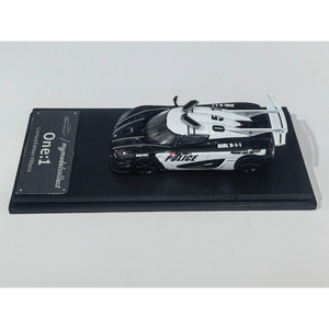 Lot57Supplies Diecast Shop 1:64 scale MC Koenigsegg One:1 diecast model car in black and white police livery.