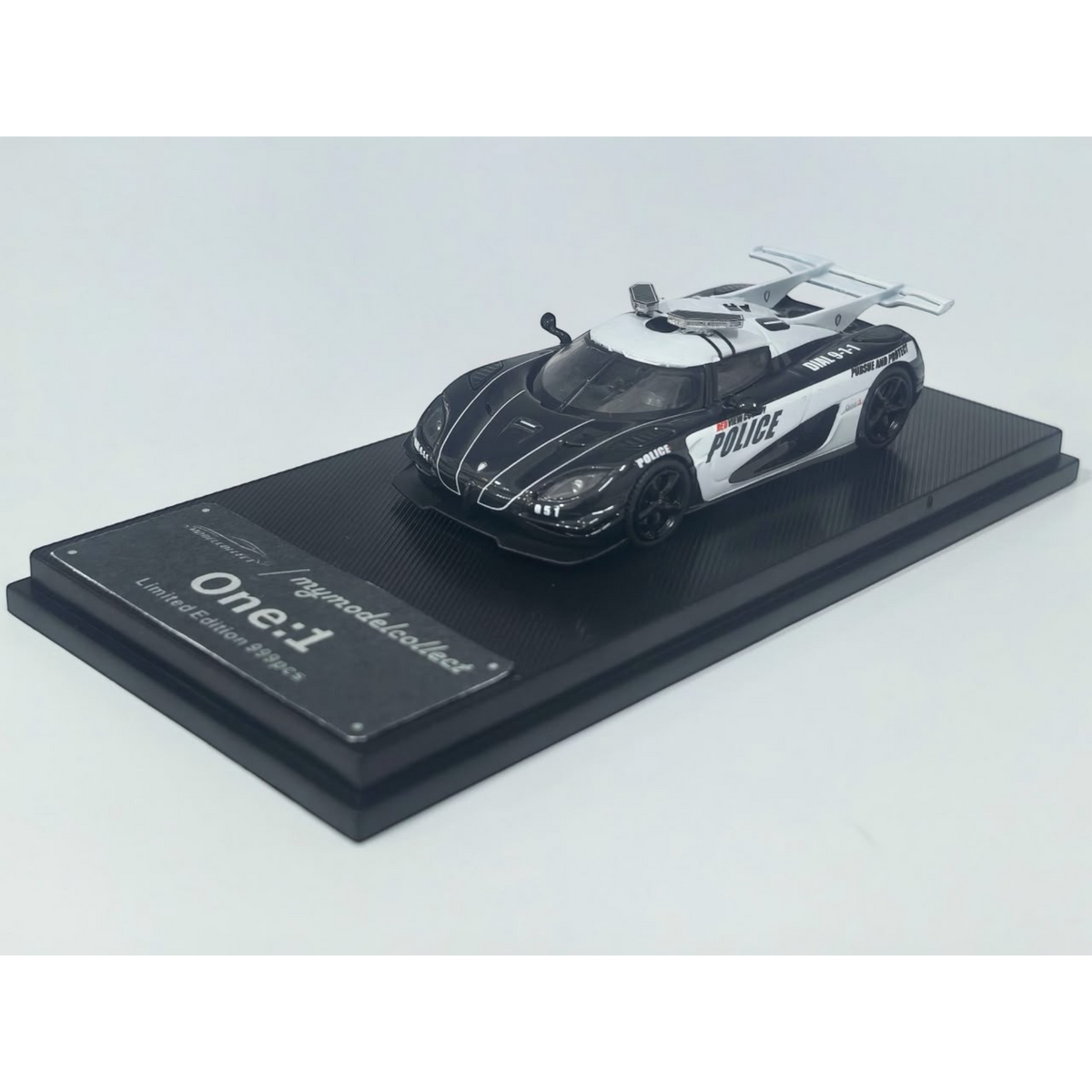 Lot57Supplies Diecast Shop 1:64 scale MC Koenigsegg One:1 diecast model car in black and white police livery