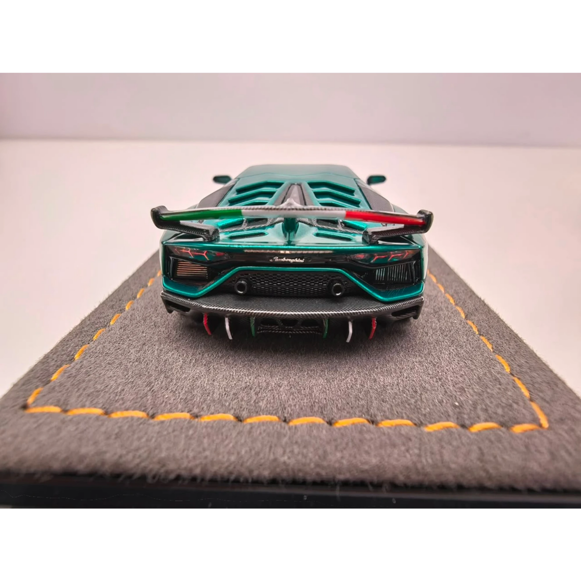Lot57Supplies Diecast Shop GodWealth 1:64 scale resin Lamborghini Aventador SVJ in anniversary blue, rear view.
