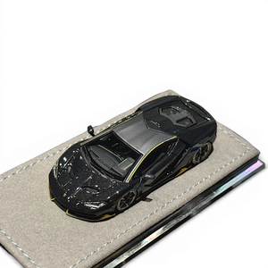 Lot57Supplies Diecast Shop 1:64 scale resin Lamborghini Centenario model in black carbon with yellow accents