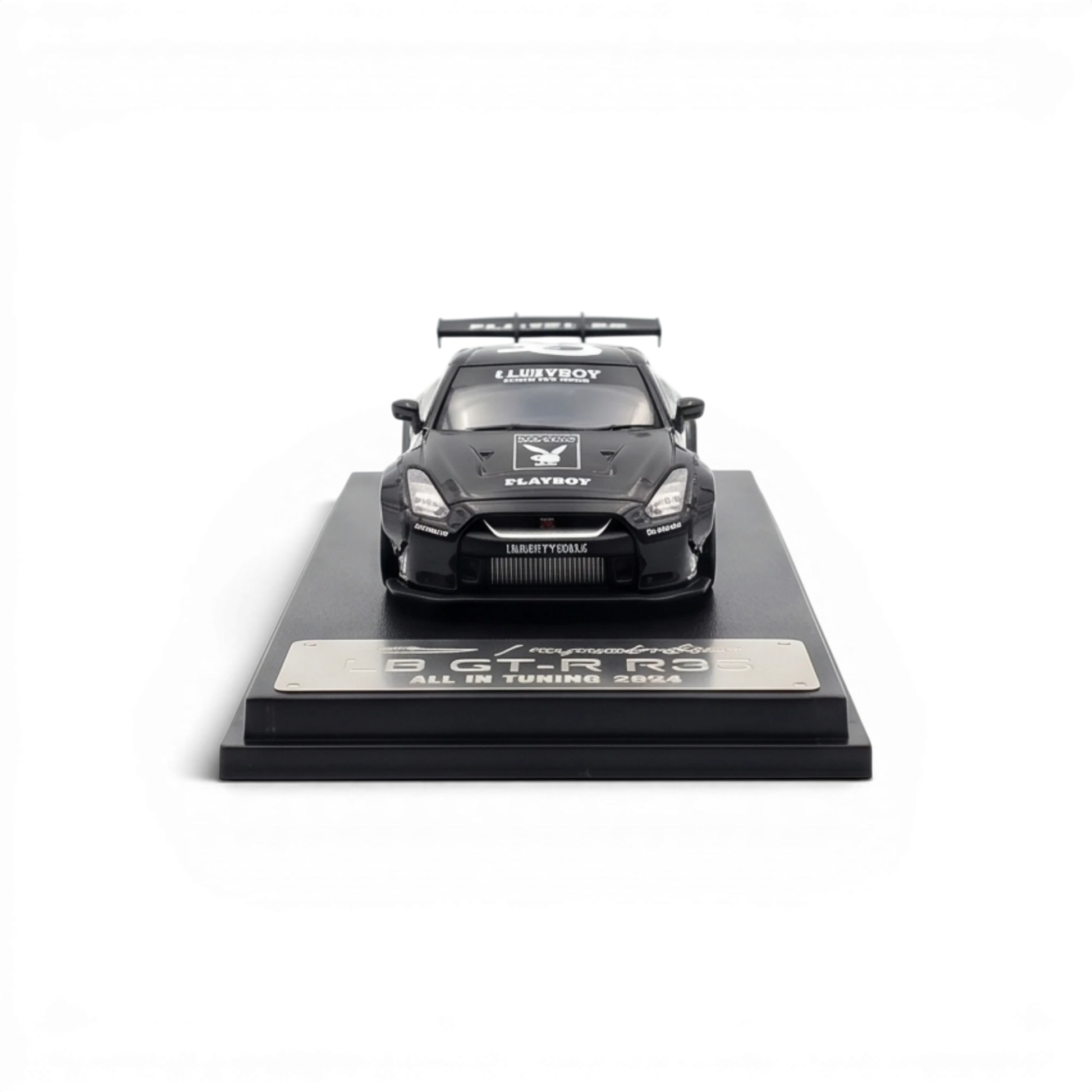 Lot57Supplies Diecast Shop 1:64 scale glossy black LB GTR 1.5 diecast model car with PLAYBOY livery on display base