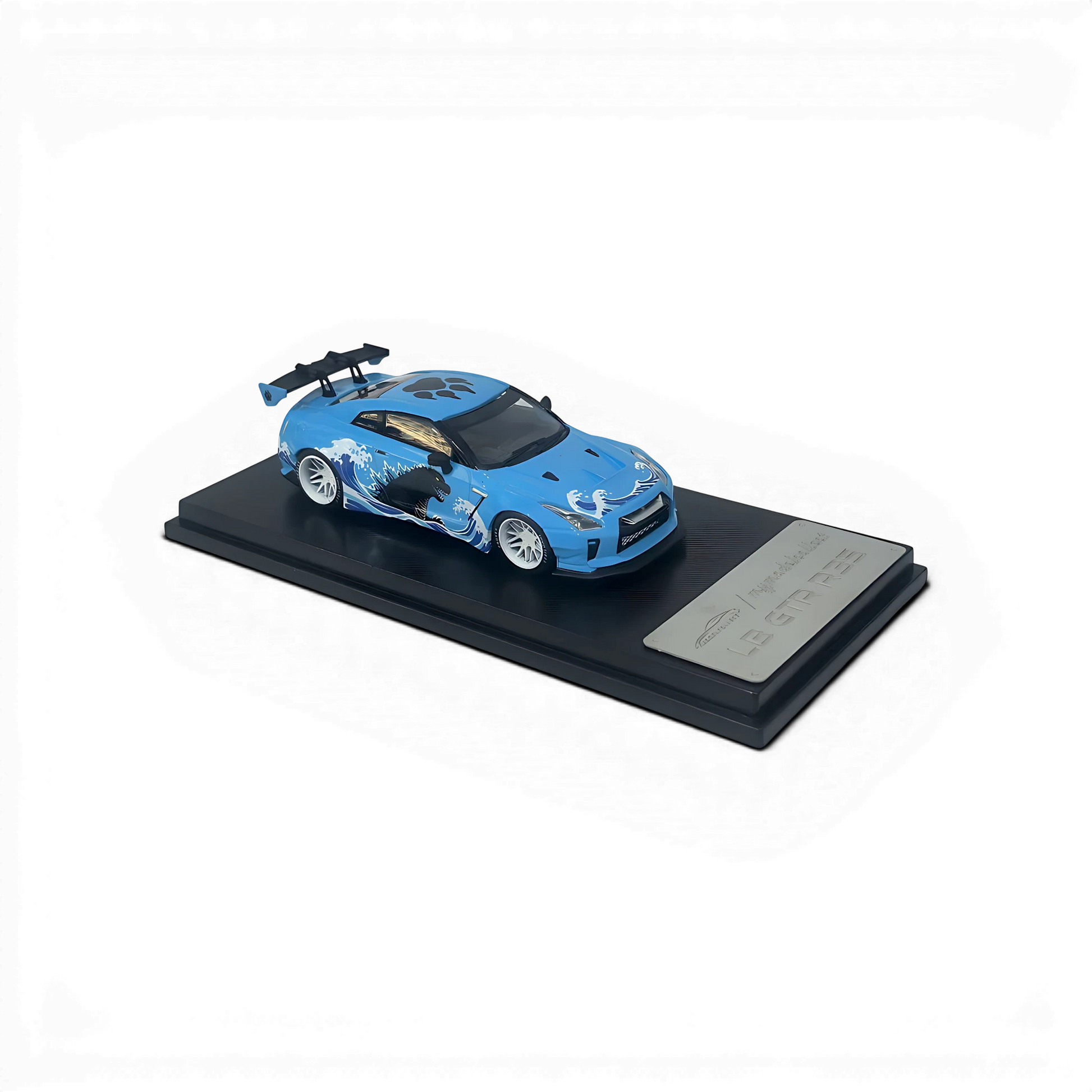 Lot57Supplies Diecast Shop 1:64 scale MC LB GTR 1.5v diecast model car with blue Godzilla livery on display base