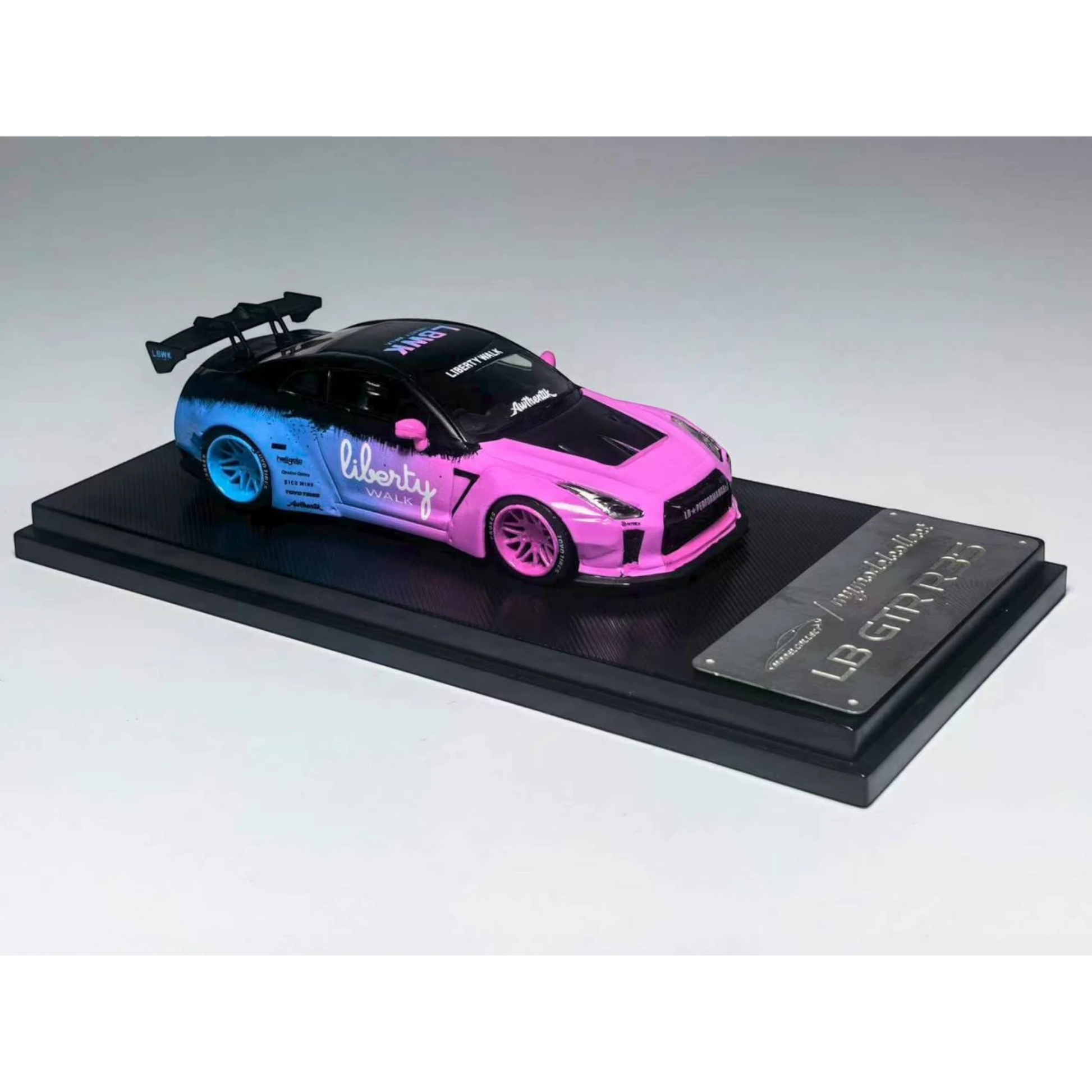 Lot57Supplies Diecast Shop 1:64 scale MC LB GTR 1.5 diecast model car in flash pink and blue livery with racing decals