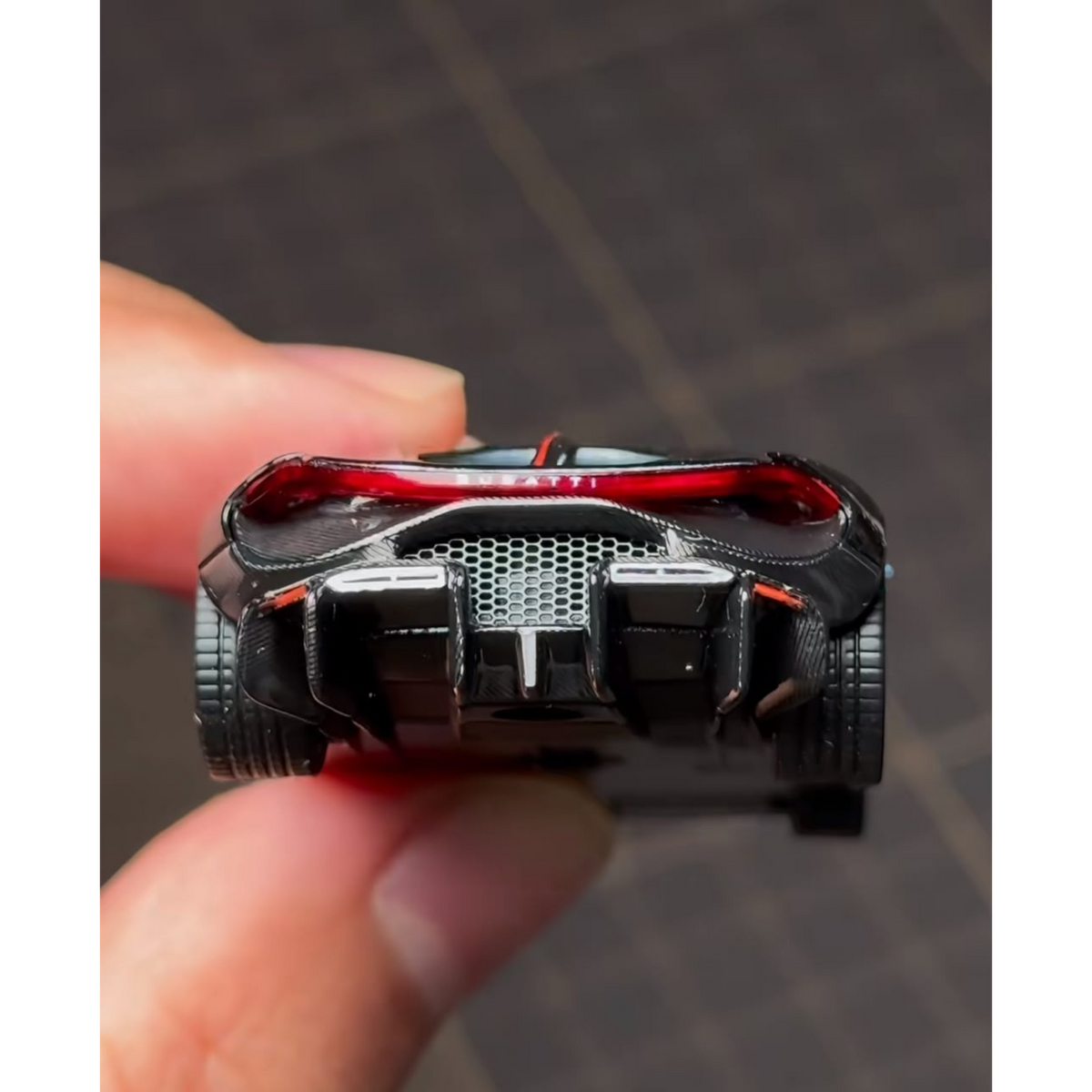 Rear view of Lot57Supplies Diecast Shop Liberty 64 Tourbillon 1:64 scale diecast car in Atlantic Blue Metallic