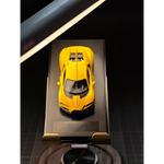 Lot57Supplies Diecast Shop Liberty 64 Tourbillon 1:64 scale diecast car in bright yellow with black interior
